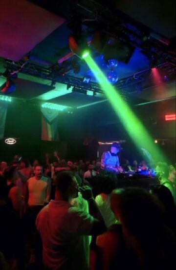 Attendees at a Malta Pride after-party celebrating inside Liquid Club.